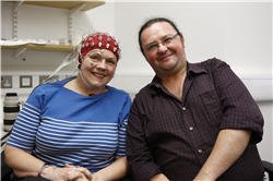 An image of me and a chorus volunteer ready for an EEG experiment